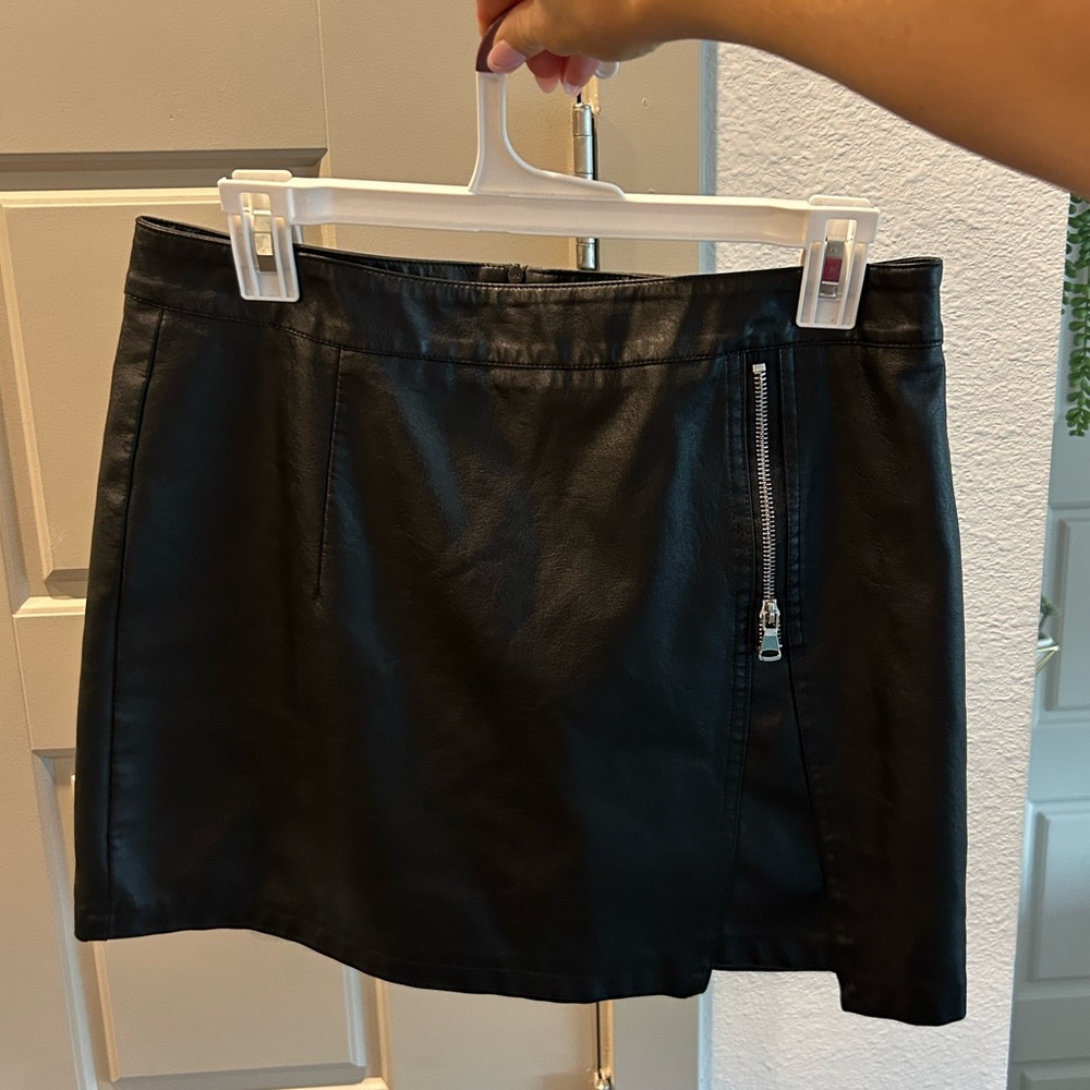 Black leather mini skirt